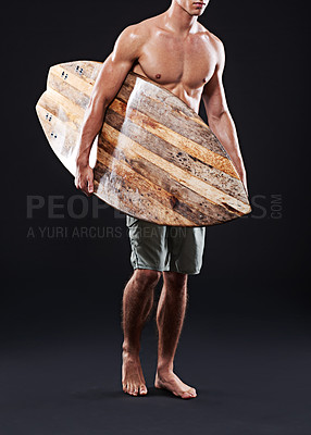 Buy stock photo Male surfer and sports with vintage board for exercise and fun in studio portrait. Wave rider and shirtless man with retro surfboard for fitness, workout and summer vacation on black background