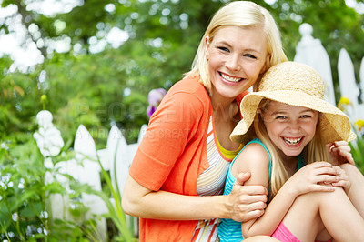 Buy stock photo A young girl spending time with her mother 