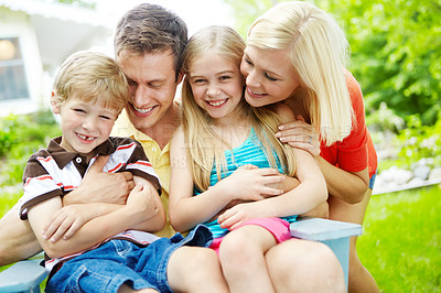 Buy stock photo Happy young family spending time together outdoors