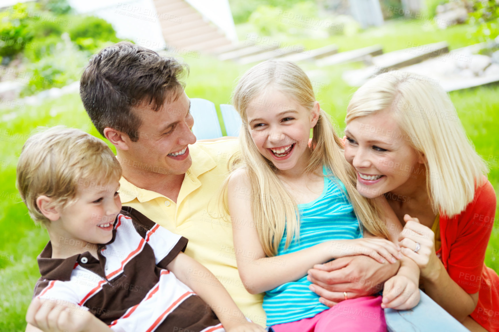 Buy stock photo Happy young family spending time together outdoors