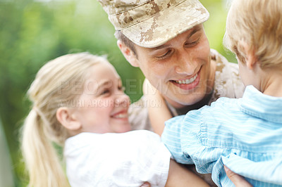 Buy stock photo Outdoor, soldier and reunion with children, hug and excited with dad, smile or hero with love of kids. Family, father and parent from military, embrace or man with care for boy, girl or home from war