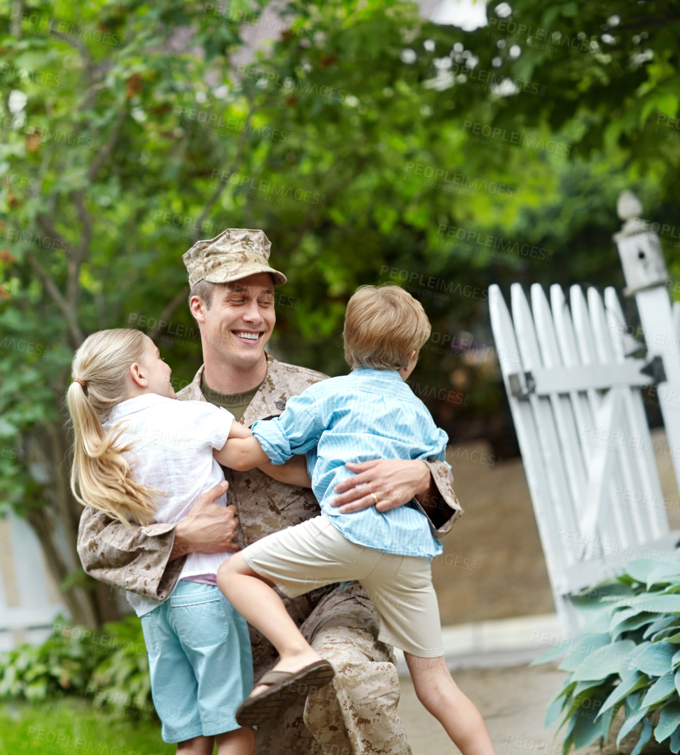 Buy stock photo Happy, army and father with hug children of emotional celebration, hug and safety of military service return. Man, soldier and kids with embrace for reunion together, patriotism and house garden