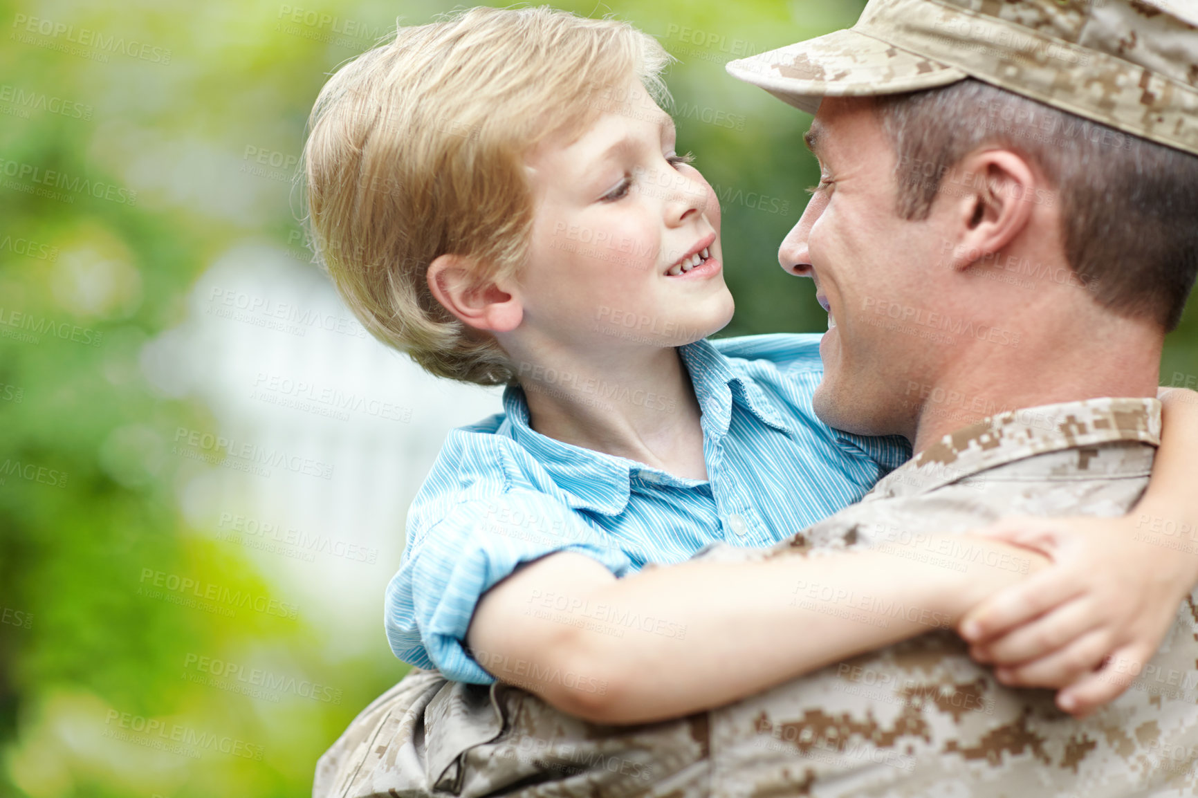 Buy stock photo Outdoor, soldier and reunion with boy, smile and excited for dad, hug or hero with love of kid. Family, father and parent from military, embrace and care for child, portrait and man after war or home