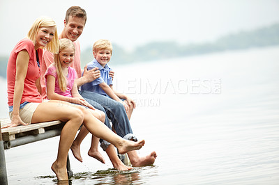 Buy stock photo Lake, family and portrait with foot in water for holiday in the summer in mock up to relax with sunshine. Children, parents and adventure on deck at vacation in the outdoor together on mockup space