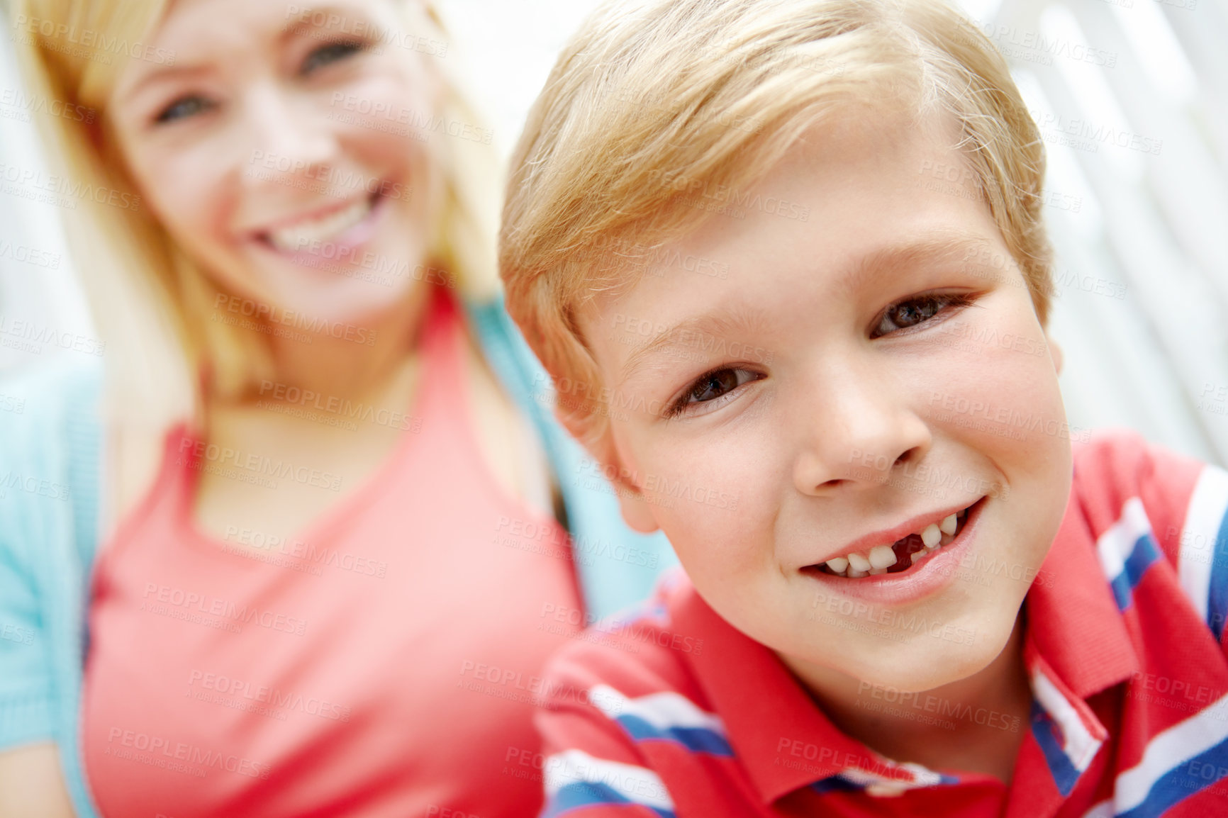 Buy stock photo Portrait, mom and happy child in home for love, care and bonding together. Face, boy and kid smile with mama in living room for family connection, relationship and son with parent on mothers day