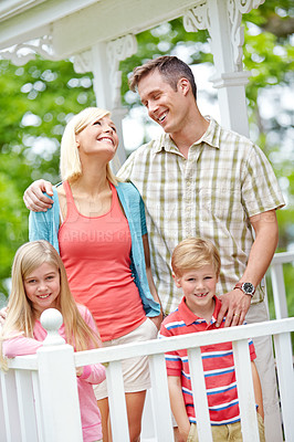 Buy stock photo Home, parents and smile with kids on porch for bonding, love and support in Canada. People, family and happy with trust, laughing and care on break for child growth,  development and hugging