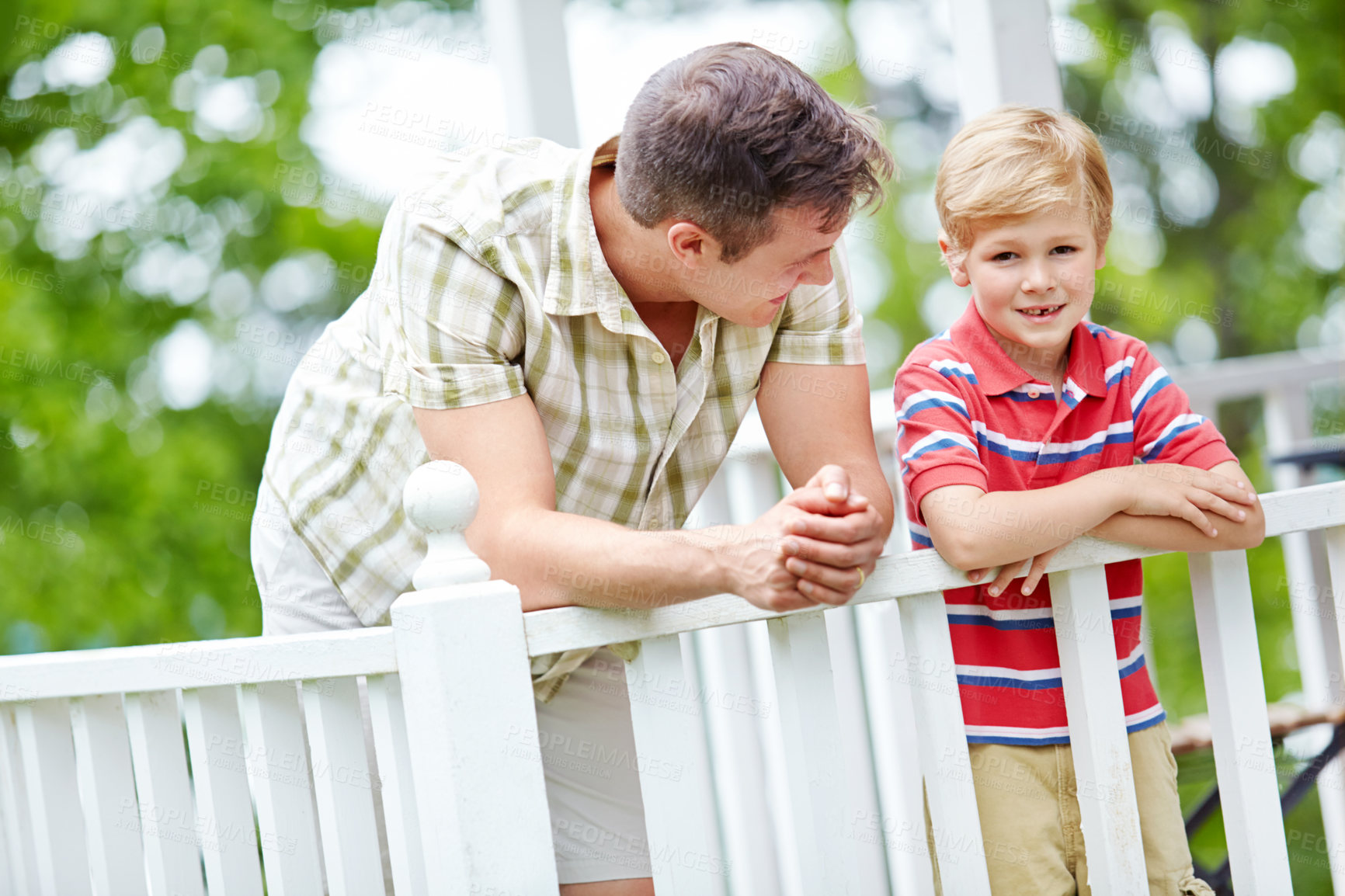 Buy stock photo Home, boy and smile with father on balcony for support, bonding and care in Canada. People, parent and happy with kid as family on break with love, trust and relax for child growth and development