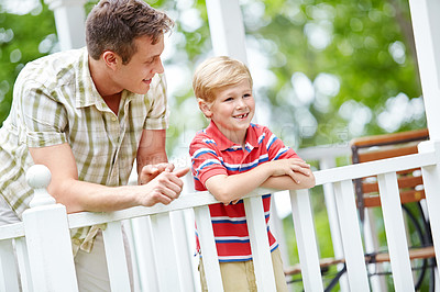 Buy stock photo Love, patio or smile with father and son outdoor in garden of home for bonding, future or growth. Family, planning or vision with single parent man and boy child in backyard for conversation or trust