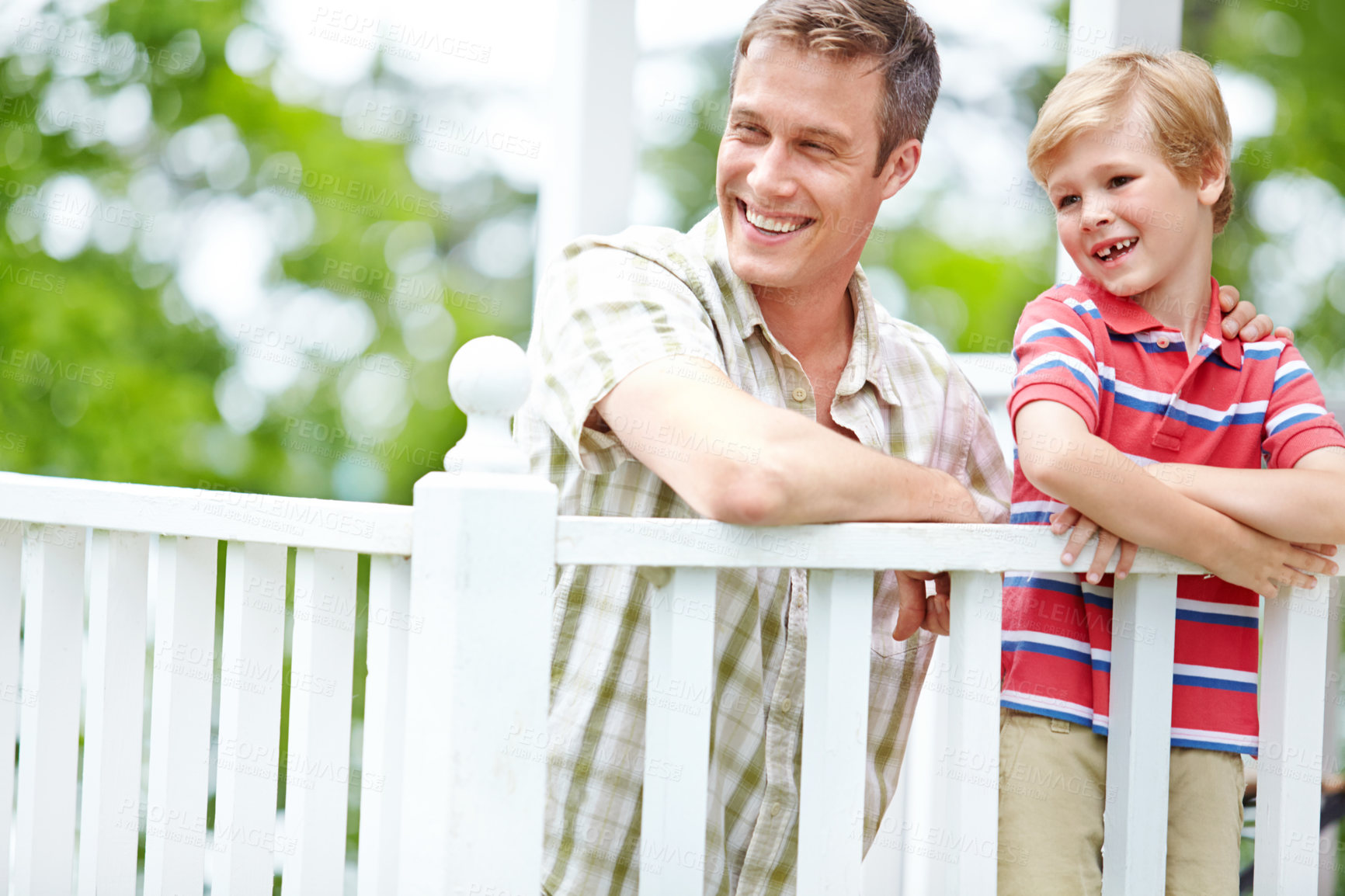 Buy stock photo Home, boy and happy with dad on balcony for support, bonding and care in Canada. People, parent and smile with kid as family on break with love, trust and relax for child growth and development