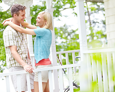 Buy stock photo Happy, hugging and love with couple on porch in garden of home for bonding, romance or support. Security, smile or trust with man and woman on backyard veranda for embrace moment or relationship