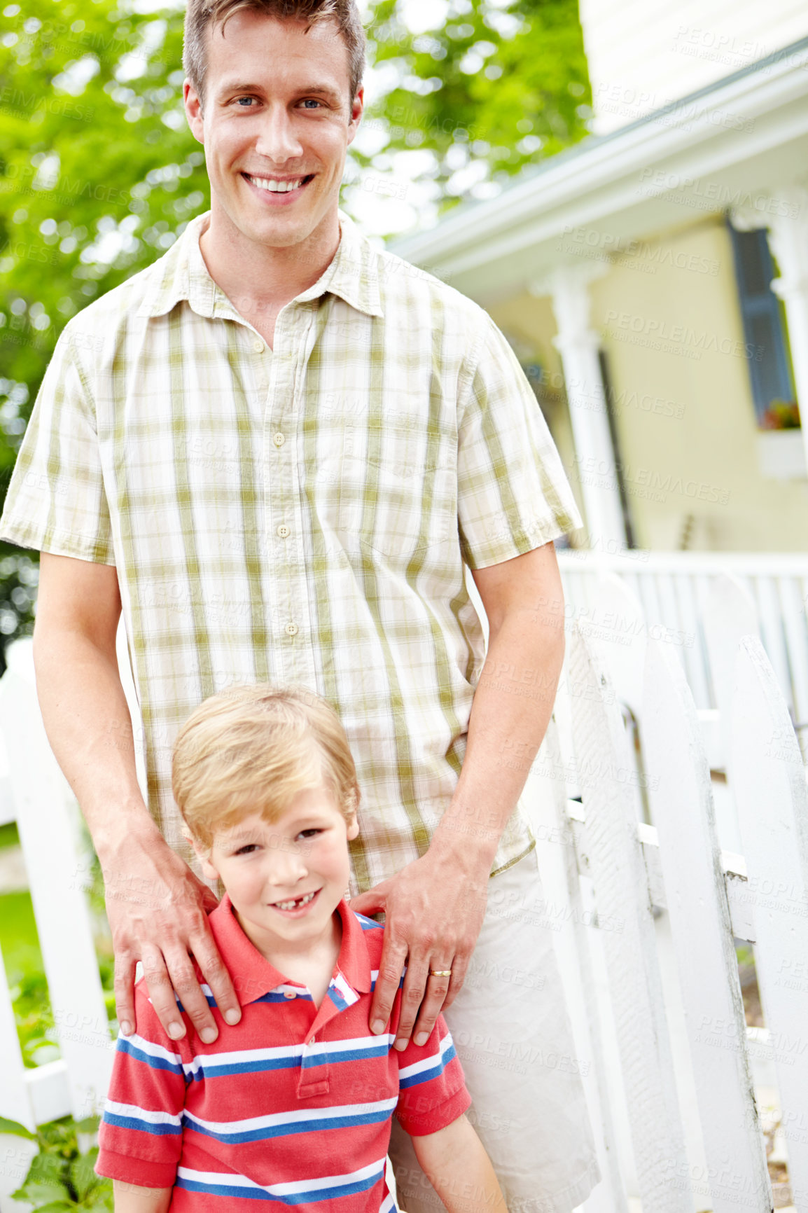 Buy stock photo Home, dad and smile with son outdoor for bonding, love and support in Canada. People, parent and happy with kid on portrait with trust, laughing and care on break for child growth and development