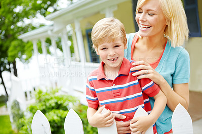 Buy stock photo Home, mom and smile with son outdoor for bonding, love and support in Canada. People, parent and happy with kid on portrait with trust, laughing and care on break for child growth and development