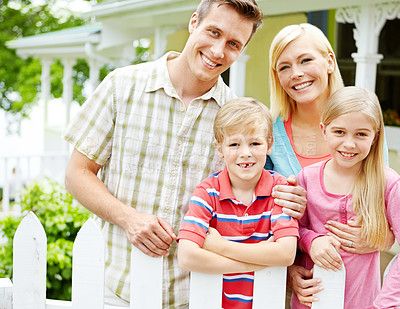 Buy stock photo Shot of a young family of four outside
