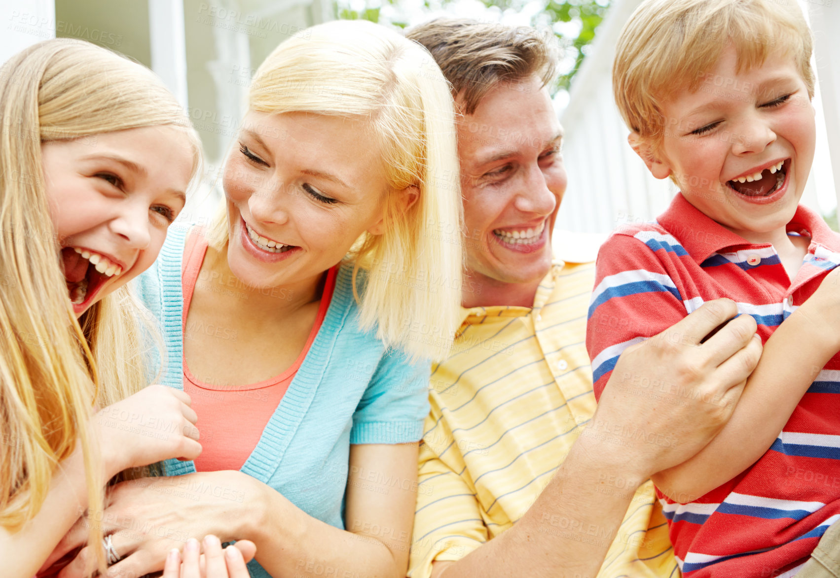 Buy stock photo Shot of a young family of four outside