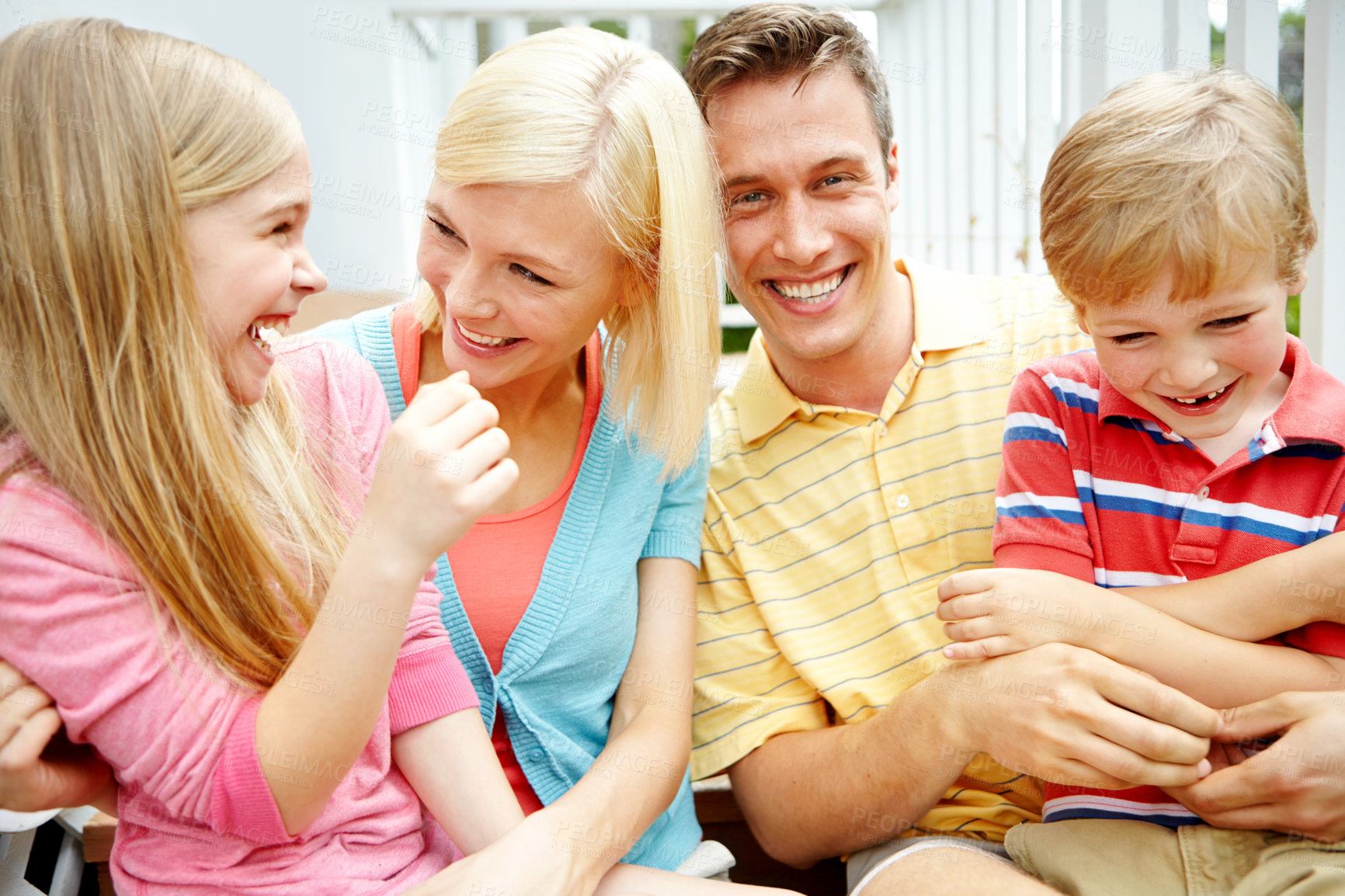 Buy stock photo Shot of a young family of four outside