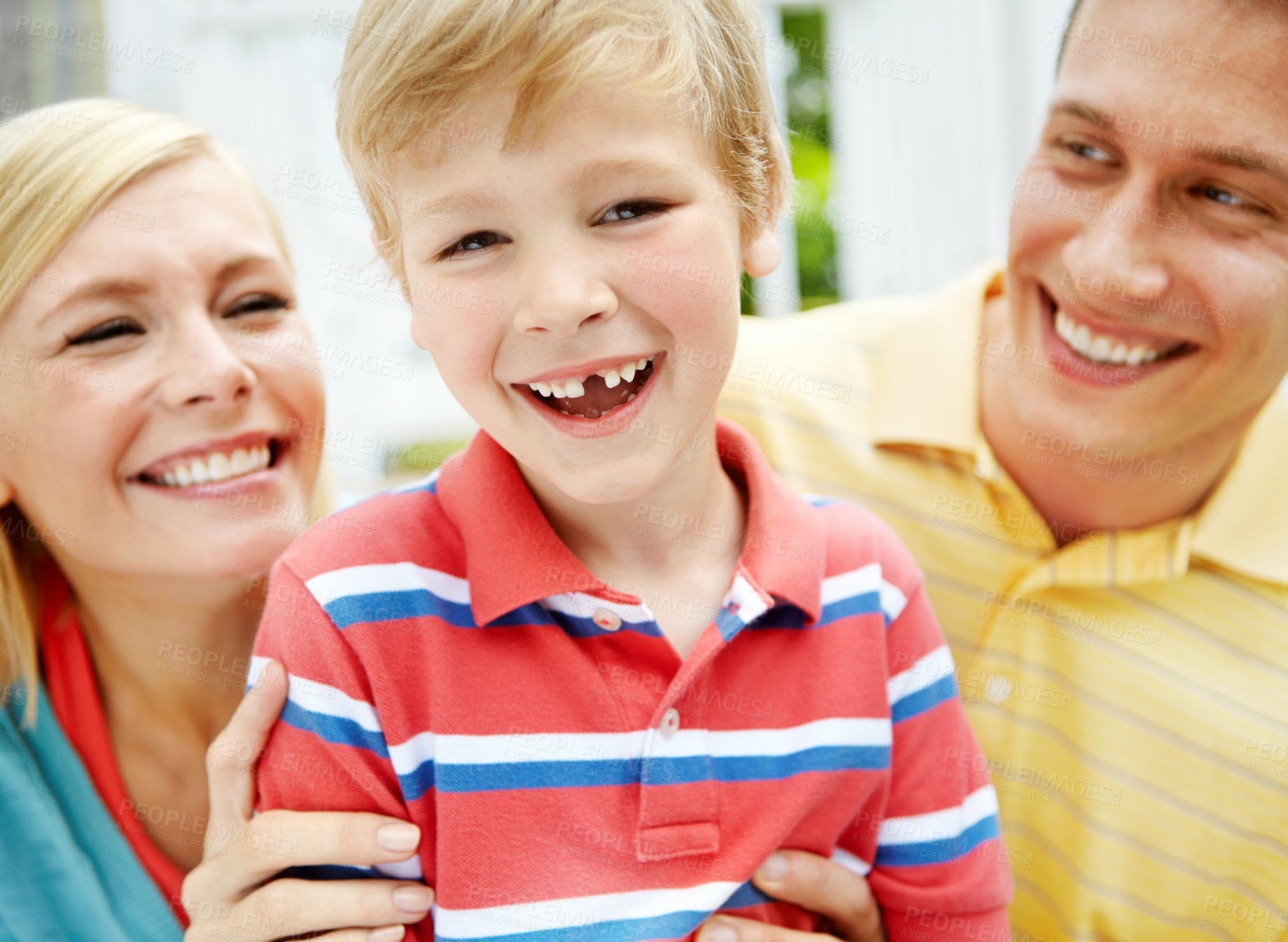 Buy stock photo Home, son and smile with parents on outdoor for support, bonding and proud in Canada. People, family and happiness with kid on portrait with break, trust and relax for child growth and development