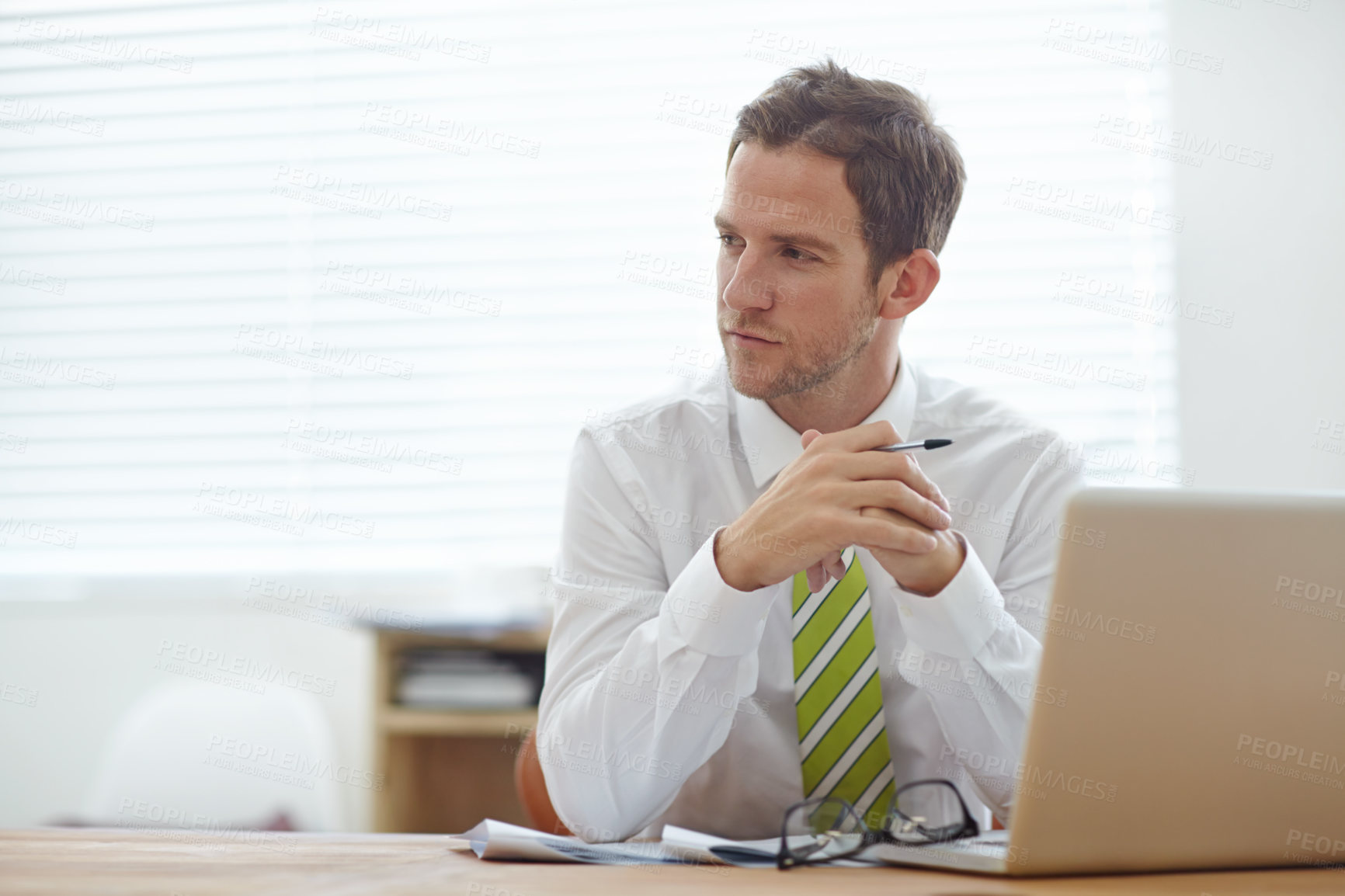 Buy stock photo Thinking, laptop and business man in office for reflection, memory and email on company policy. Research, brainstorming and mindset with male employee in agency for solution, project and proposal