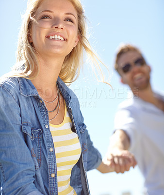 Buy stock photo Love, holding hands and couple walking, happy and enjoy outdoor quality time together, bond and fun romantic date. Freedom, peace and happiness for man and woman on summer holiday in Lisbon Portugal