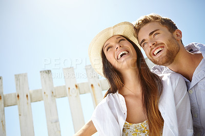 Buy stock photo Love, laugh and blue sky mockup with a couple on a date outdoor for romance or honeymoon travel. Space, summer and dating with a man and woman bonding together outside during holiday or vacation