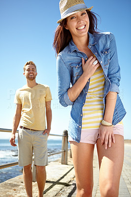 Buy stock photo Portrait, date and summer with a couple on the promenade, walking together for romance or vacation. Nature, beach and blue sky with a man and woman enjoying a walk while bonding, dating or on holiday