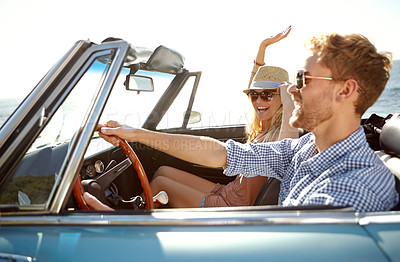 Buy stock photo Car road trip, travel and fun couple on bonding holiday adventure, transportation journey or outdoor summer vacation. Love flare, convertible vehicle and driver driving on Australia countryside tour