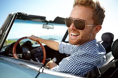 Buy stock photo Car road trip, travel and portrait man on holiday adventure, happy transportation journey or fun summer vacation. Flare, sunglasses and driver driving convertible vehicle on Canada countryside tour