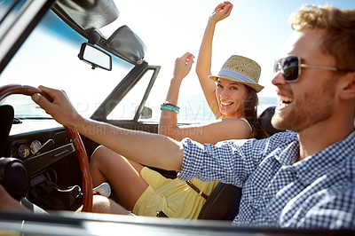 Buy stock photo Car road trip, travel and happy couple laughing on holiday adventure, transportation journey or fun summer vacation. Love bond, convertible vehicle and male driver, man and woman driving in Canada
