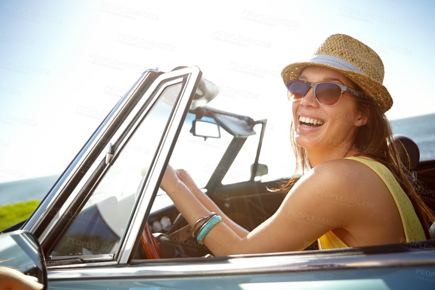 Buy stock photo Travel, road trip and woman in car for holiday, summer adventure and freedom on vacation by ocean. Travelling lifestyle, happiness and girl driving in motor vehicle for relaxing, break and journey