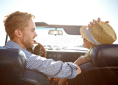 Buy stock photo Car road trip, travel and back of couple on bonding holiday adventure, transportation journey or fun summer vacation. Love flare, convertible automobile and driver driving on Canada countryside tour