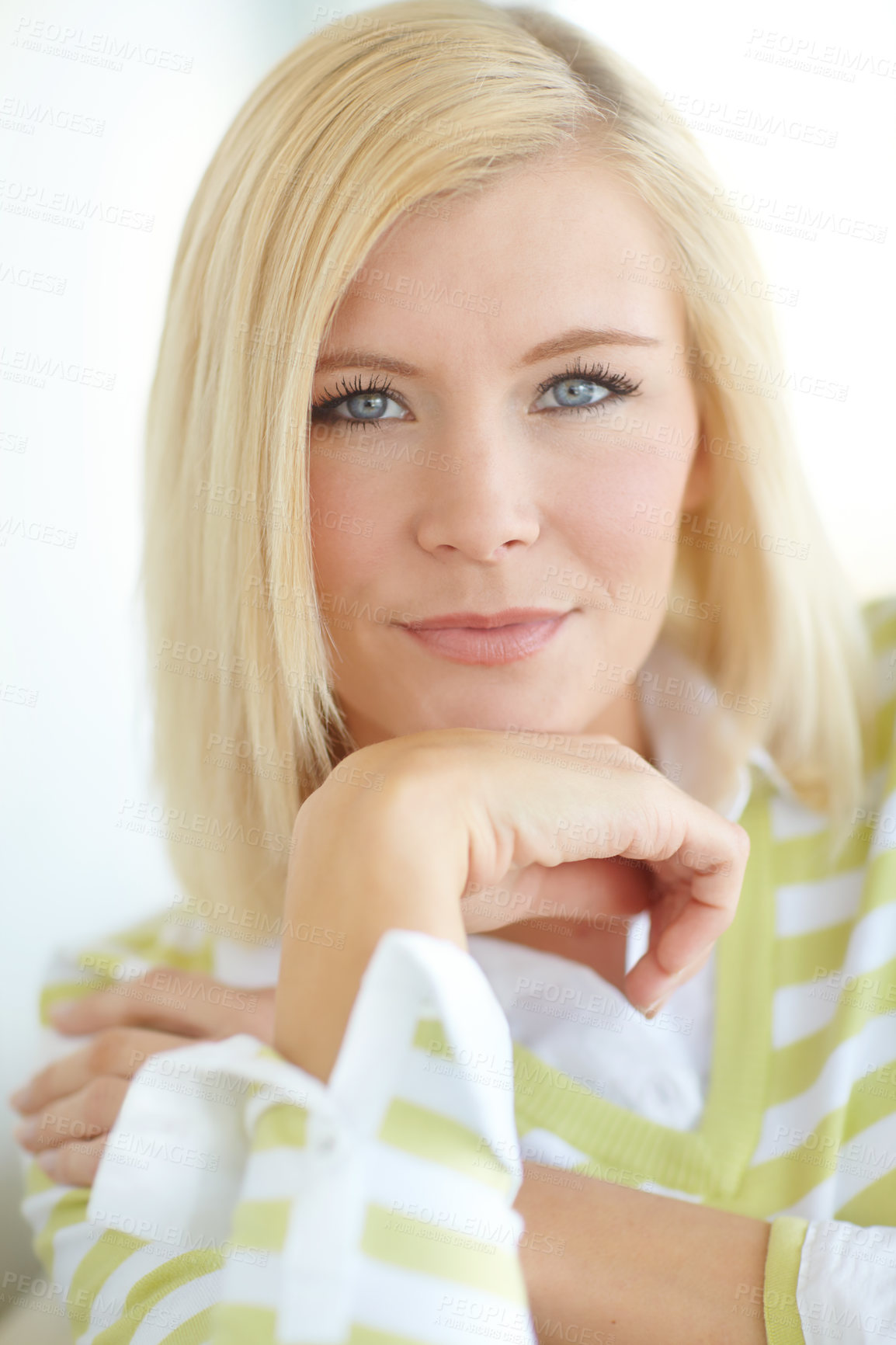 Buy stock photo Shot of a beautiful blonde woman relaxing at home