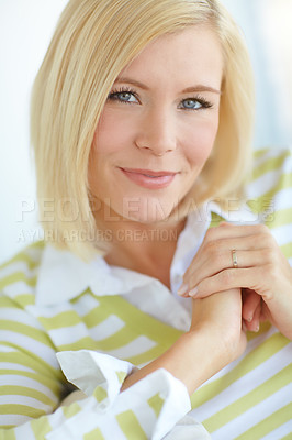 Buy stock photo Shot of a beautiful blonde woman relaxing at home