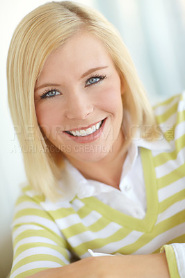 Buy stock photo Shot of a beautiful blonde woman relaxing at home