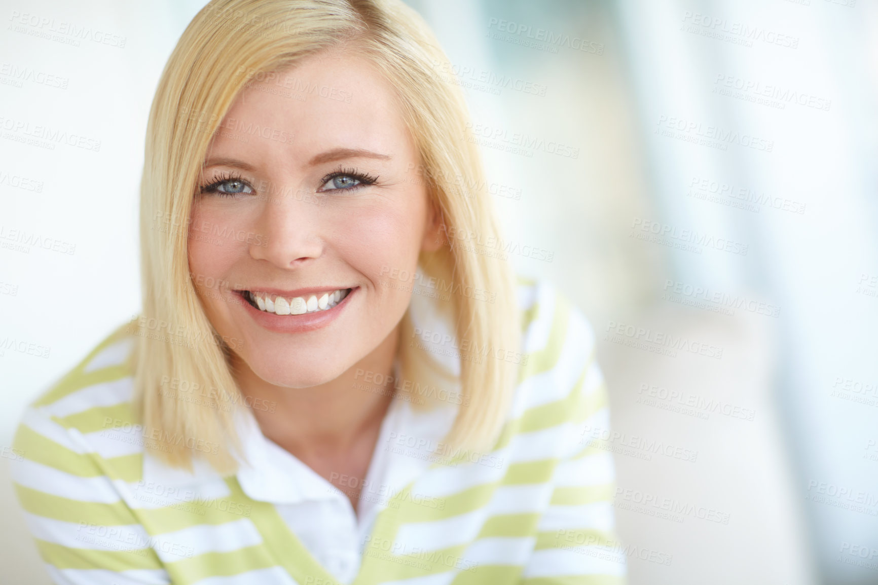 Buy stock photo Shot of a beautiful blonde woman relaxing at home