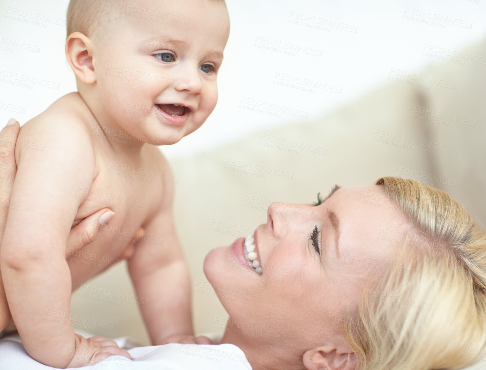 Buy stock photo Cute little baby spending time with it's mother