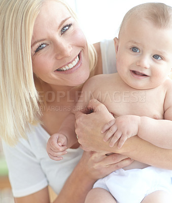 Buy stock photo Cute little baby spending time with it's mother