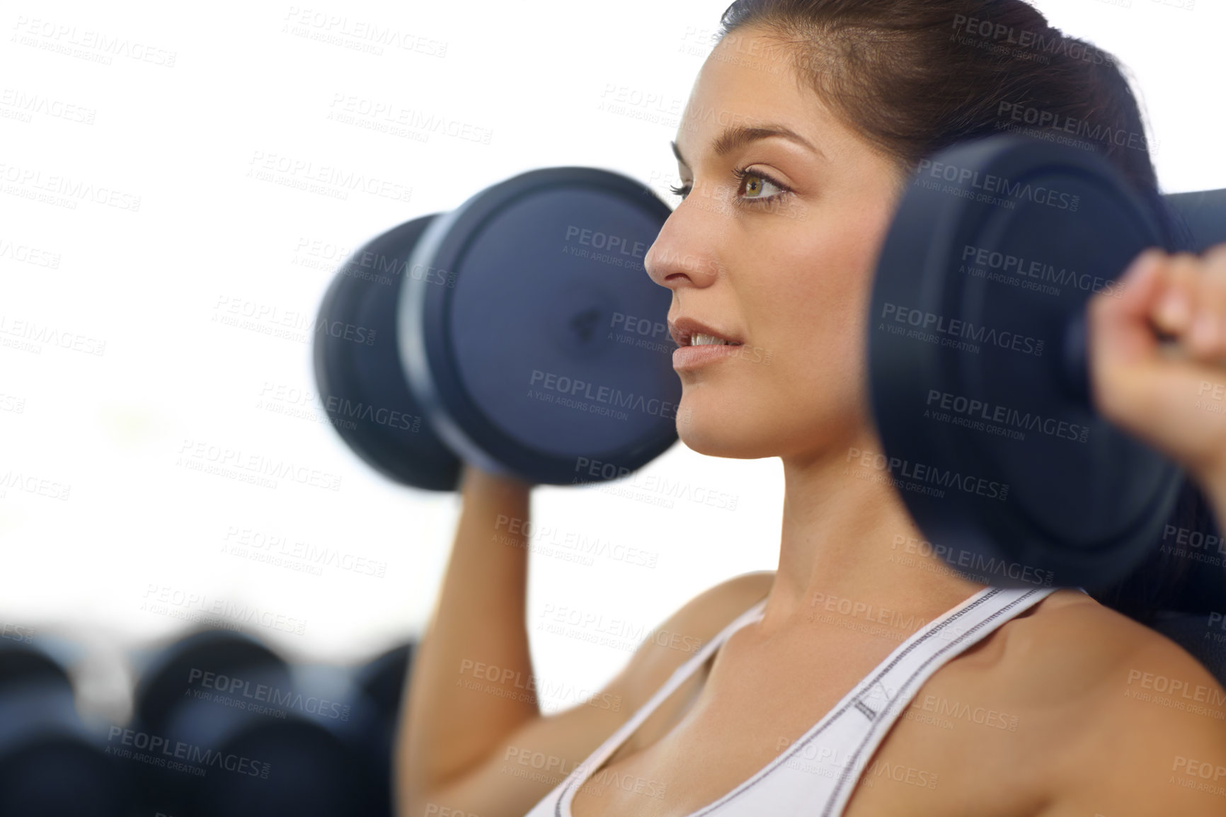 Buy stock photo Shoulder press, sports or woman with dumbbells for fitness, workout or gym for arms or health. Arm strength, balance or bodybuilder lifting weights for exercise, body training or muscle in Germany