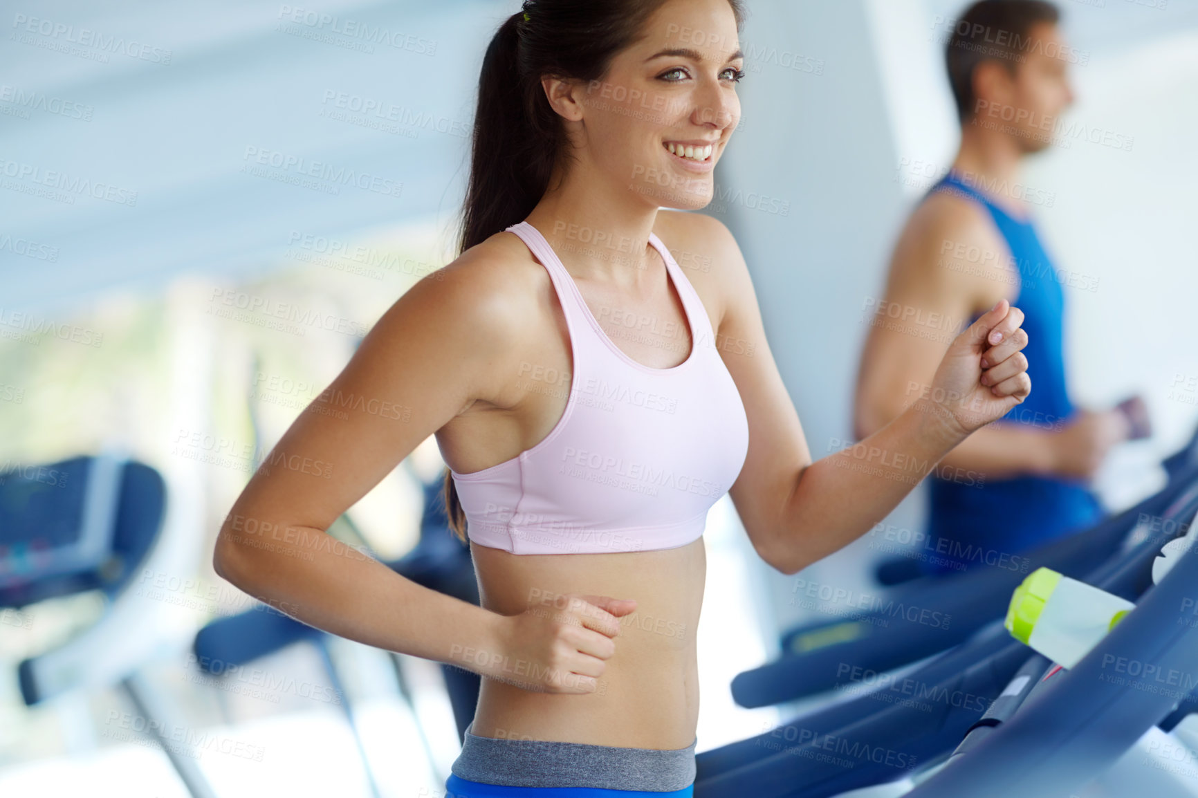 Buy stock photo Athlete, fitness and running with treadmill for exercise, workout or cardio training in gym. Smile, woman or sports person happy with equipment for endurance, body goals and wellness in health club