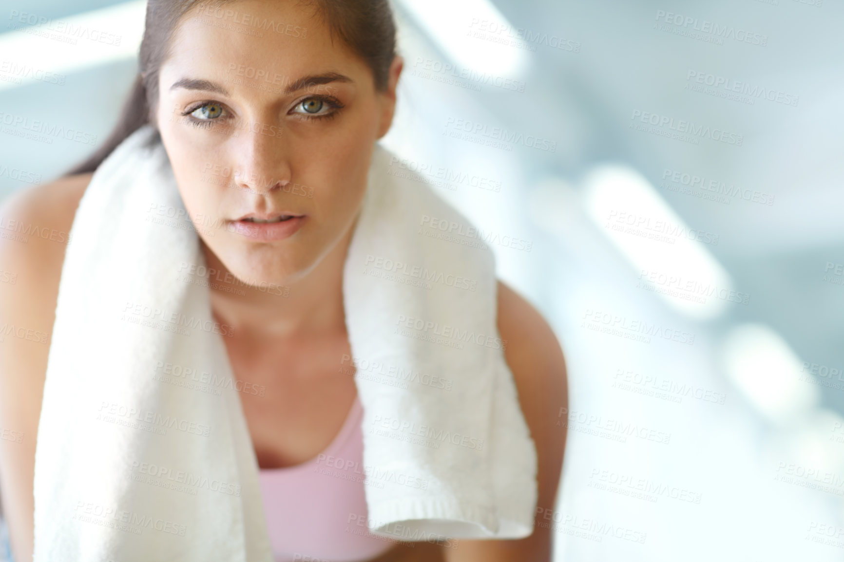 Buy stock photo Towel, portrait or tired woman on break in fitness exercise, workout and training with fatigue in gym. Girl, face or exhausted athlete resting for health, burnout recovery or breathing in Germany