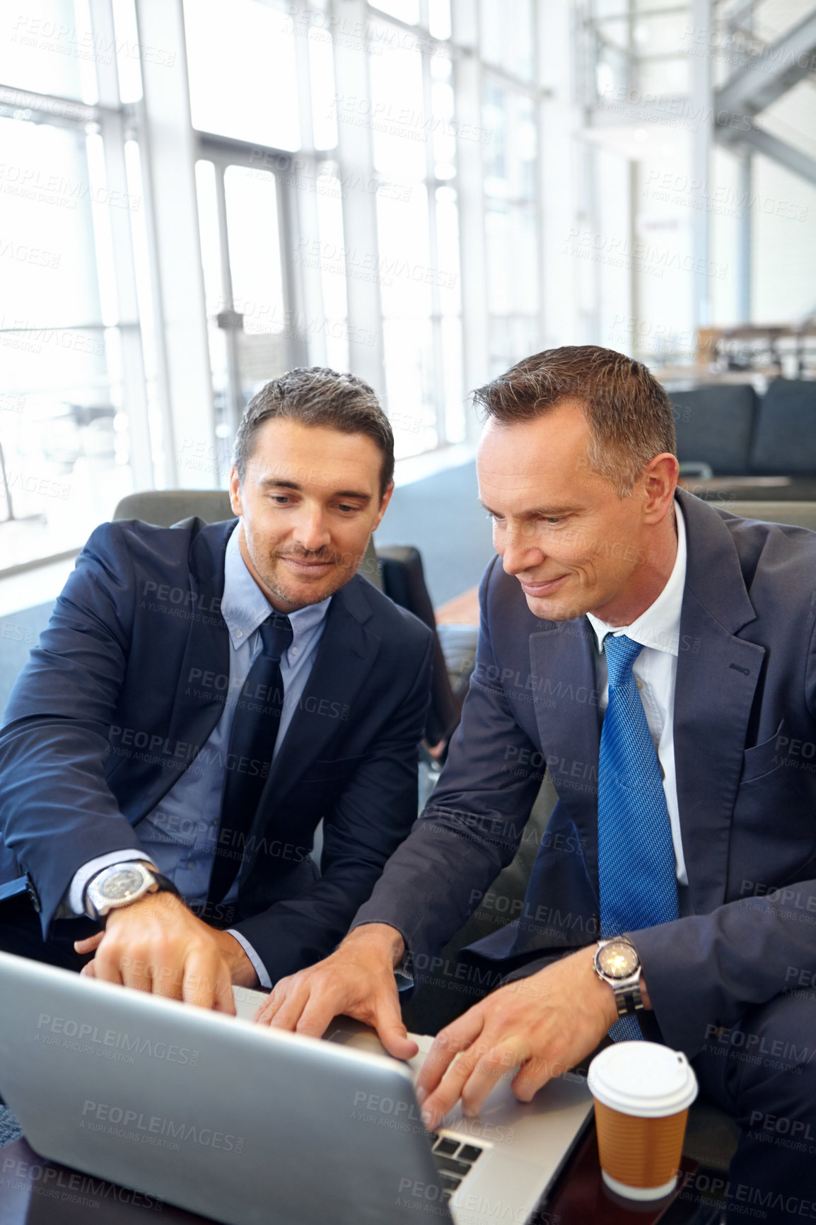 Buy stock photo Laptop, negotiation meeting and businessman and client in company lobby for strategy, planning or feedback. Professional people, financial advisor or businessman talking to partner of investment plan