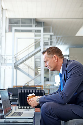 Buy stock photo Email, coffee and businessman with a laptop for work, communication and internet. Business, working and employee reading news, information and corporate chat on a computer with tea in an office