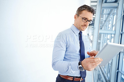 Buy stock photo Business man, tablet or reading in modern office for company review, growth or planning on travel mockup. Serious, mature or male corporate worker on digital technology or mock up schedule management