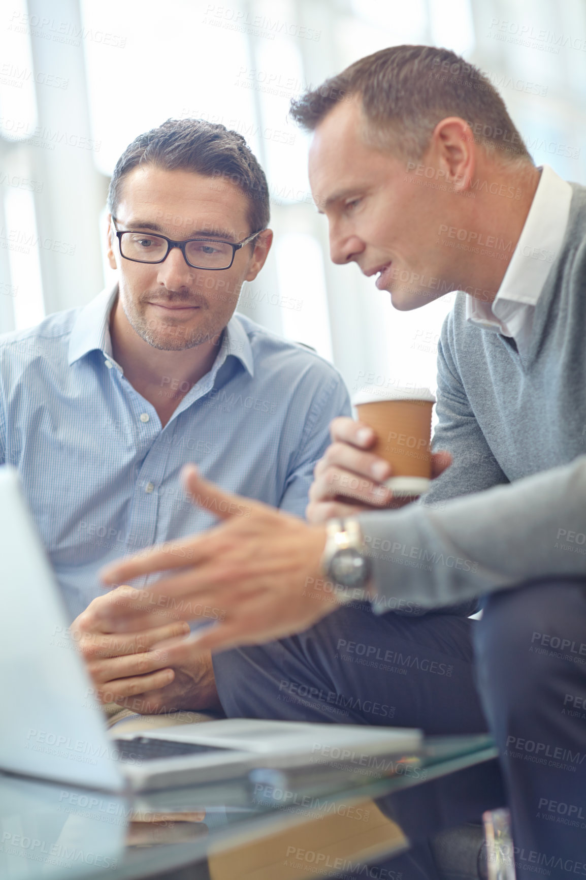 Buy stock photo Businessman, laptop and listening to idea in team discussion for deal at a corporate office. Business people talking, strategy or planning market strategy or advertising in conversation at workplace