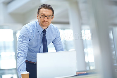 Buy stock photo Portrait, laptop and mission with a businessman working on research in his office for a report. Computer, mindset and vision with a male employee working on innovation or planning for success