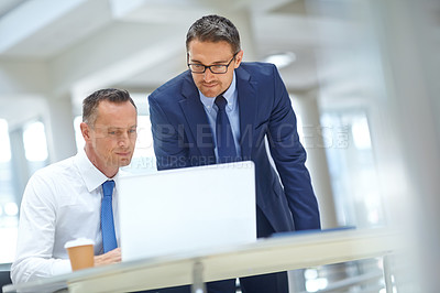 Buy stock photo Corporate, laptop and business people with leadership, teamwork and manager strategy, working and analysis. Professional businessman with management partner reading online review of company budget