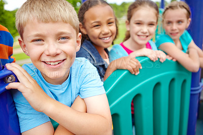 Buy stock photo Friends, diversity and kids in playground for vacation, childhood and having fun on jungle gym. Outdoors, development and portrait of children for playing, freedom and summer adventure with smile