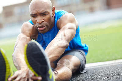 Buy stock photo Close up of a male athlete warming up for the race