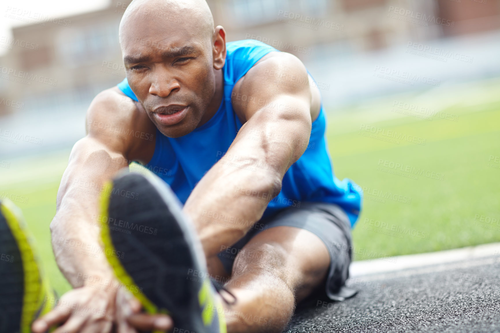 Buy stock photo Close up of a male athlete warming up for the race