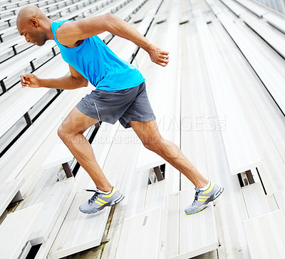 Buy stock photo Full length side view of a male runner training on the rafters