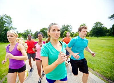 Buy stock photo Front view of a group of male and female athletes outside