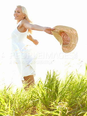 Buy stock photo Freedom, wheat farm and woman with sunhat for travel, vacation or getaway for personal growth. Happy, portrait and person from Australia with accessory for adventure, discovery or journey on holiday.